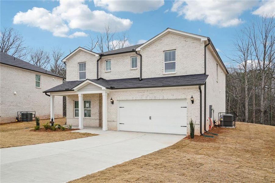 Front exterior of a new home in Hemingway - Reserve Series, Cumming, GA, highlighting curb appeal (Image 27).