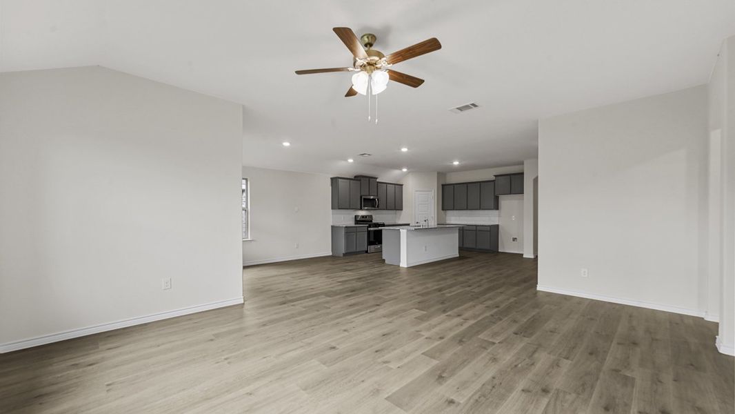 Representative unfurnished interior of a home built from the Bentworth by D.R. Horton in Elevon, Lavon (Image 9).