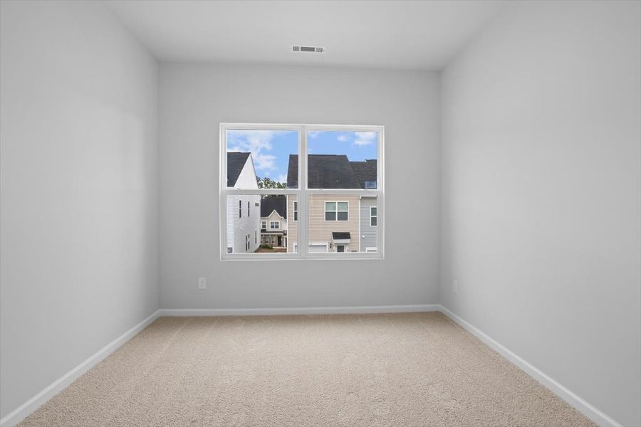Spacious, unfurnished interior of a new home in Renaissance at White Oak, Garner (Image 25).