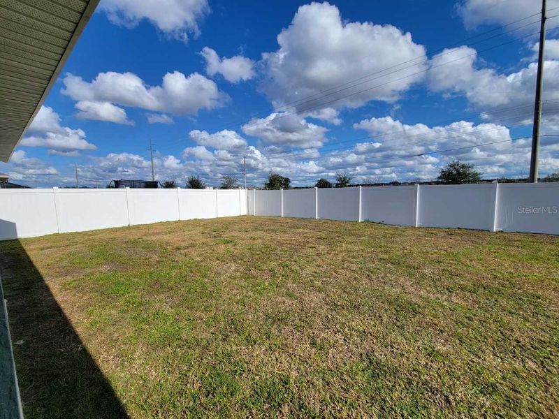 Exterior details and patio area of a home in Ocala Crossings South, Ocala (Image 15).