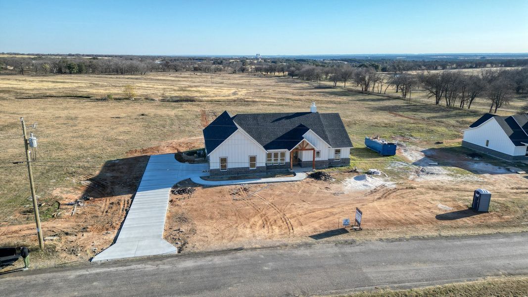 Representative exterior photo of a completed home built from the Jarrett 1 by Zeal Home Builders in Saddle Crest Estates, Weatherford, TX (Image 31).