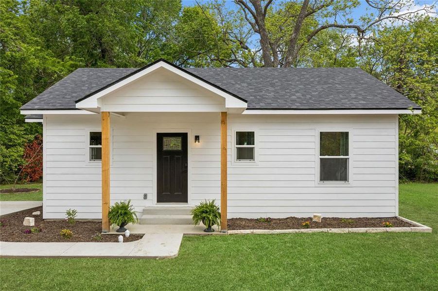 Front exterior of a new home in , Canton, TX, highlighting curb appeal (Image 23).