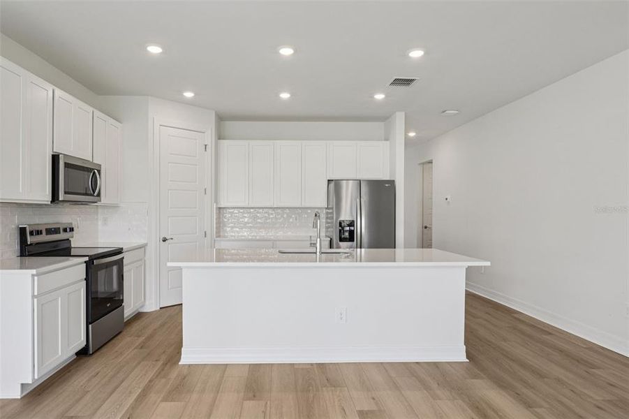 Furnished interior view inside a new home in , Punta Gorda (Image 13).