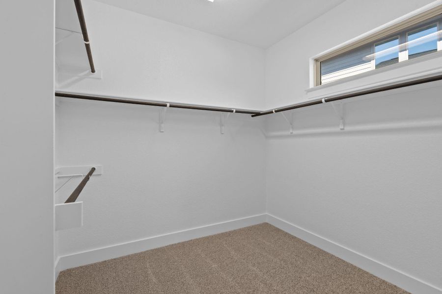 Walk-in closet in Primary Bedroom