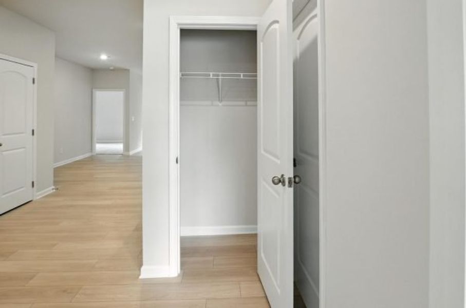 Representative unfurnished interior of a home built from the Orchard by Piedmont Residential in Villages at Cedar Hill, Dallas (Image 27).