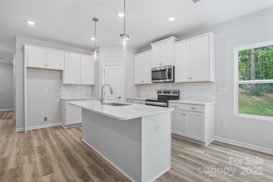 Furnished interior view inside a new home in , Statesville (Image 15).