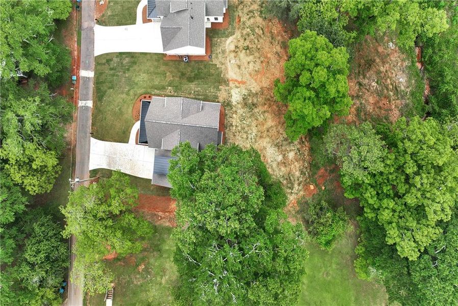 Front exterior of a new home in , Commerce, GA, highlighting curb appeal (Image 21).