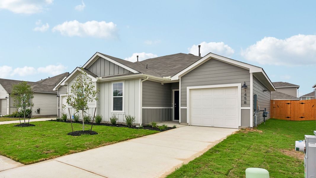 Front exterior of a new home in Wayside, Uhland, TX, highlighting curb appeal (Image 21). Front exterior of a new home in Wayside, Uhland, TX, highlighting curb appeal (Image 21).