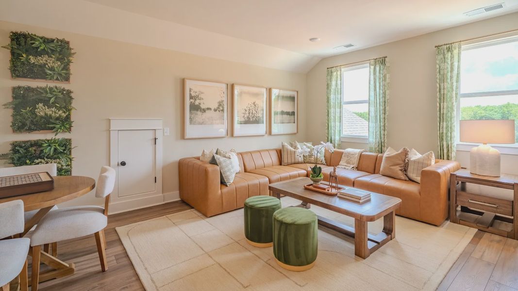 Spacious loft with hard surface flooring and bright natural lighting from windows Spacious loft with hard surface flooring and bright natural lighting from windows