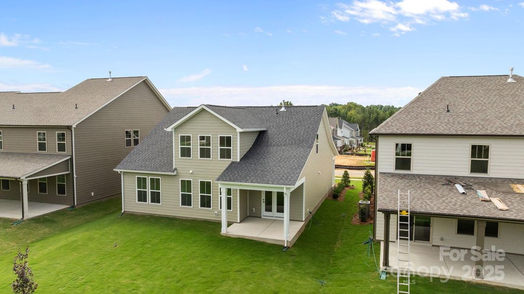 Front exterior of a new home in Lakeside Glen, York, SC, highlighting curb appeal (Image 24). Front exterior of a new home in Lakeside Glen, York, SC, highlighting curb appeal (Image 24).