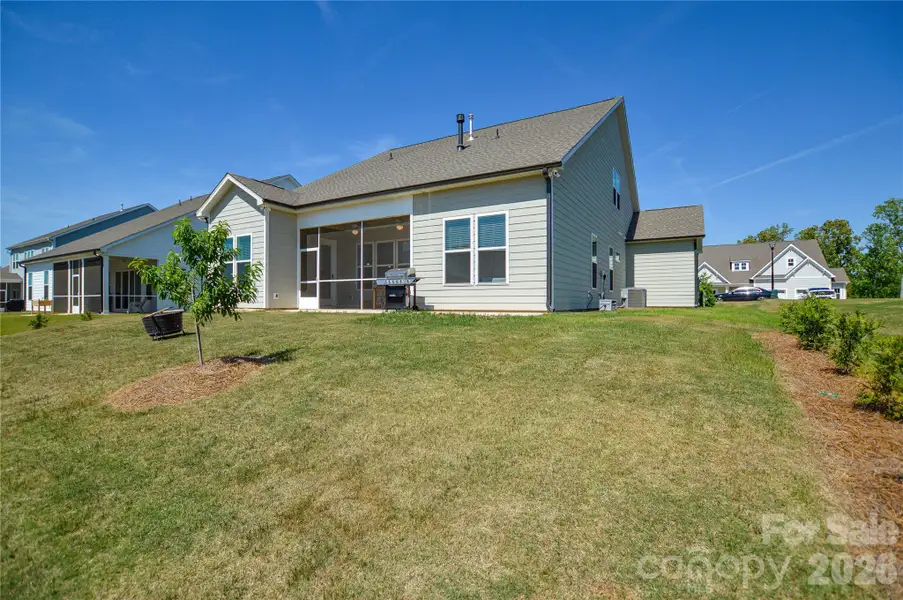 Exterior details and patio area of a home in Edgewater Lakeview On Your Lot, Lancaster (Image 3).