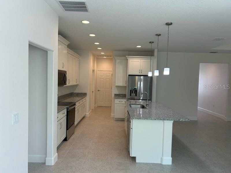 Furnished interior view inside a new home in , Palm Bay (Image 7).