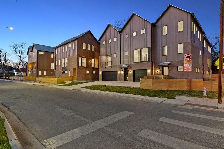 View of front of house featuring board and batten siding and a garage