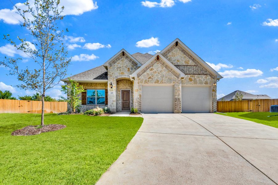 Front exterior of a new home in Summerwood, Red Oak, TX, highlighting curb appeal (Image 20).