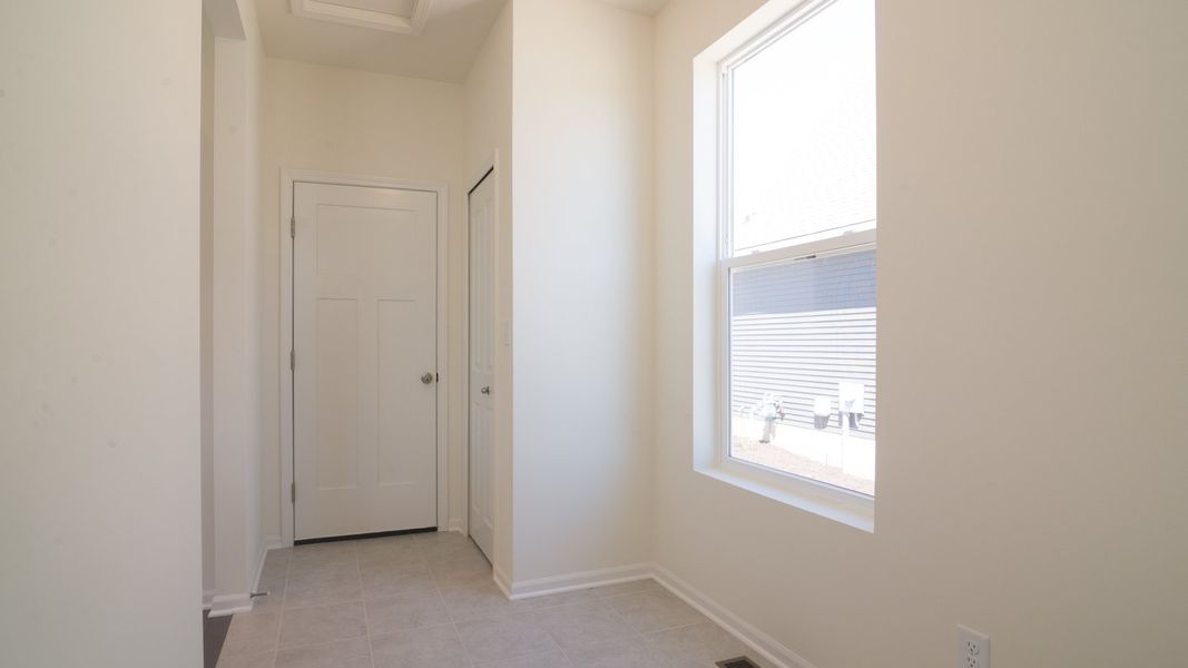 Representative unfurnished interior of a home built from the The Briarhaven III Side Entry by Norfolk Homes in Fosdick Glen of Saline, Saline (Image 60).