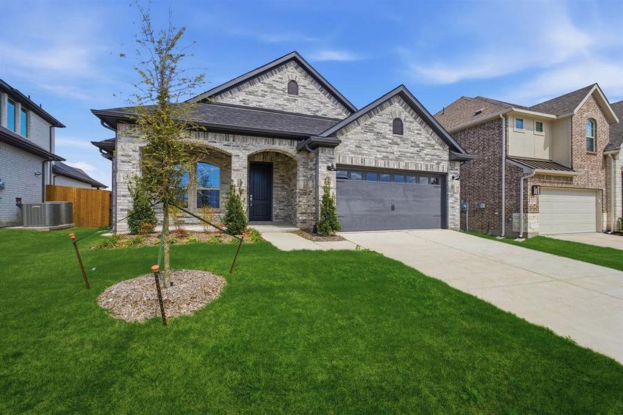Front exterior of a new home in Westridge, McKinney, TX, highlighting curb appeal (Image 17).