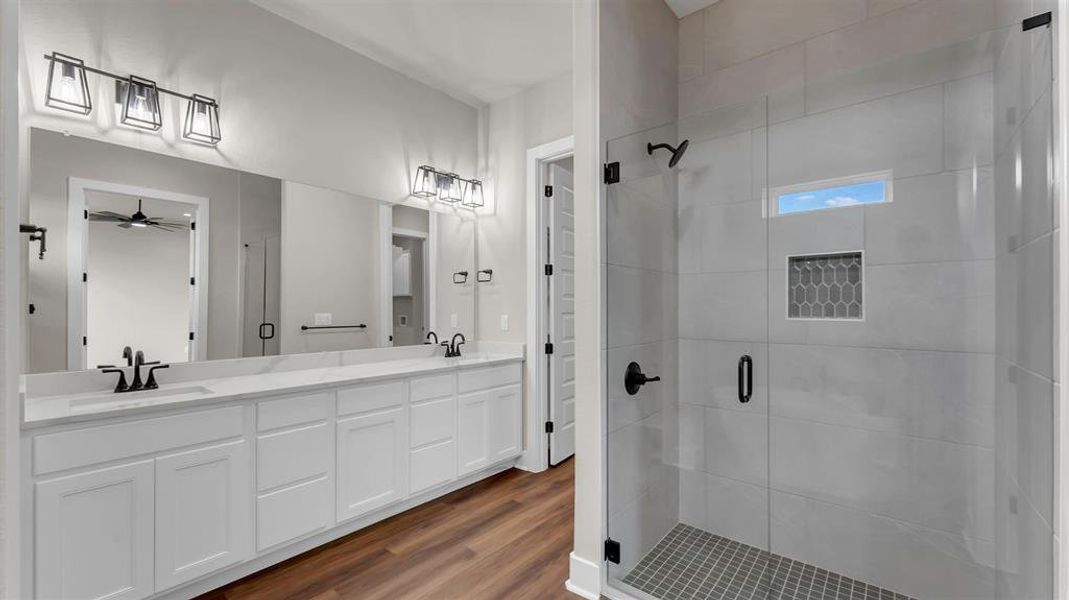 Clean lines and a spacious tile shower define this contemporary bathroom. Clean lines and a spacious tile shower define this contemporary bathroom.