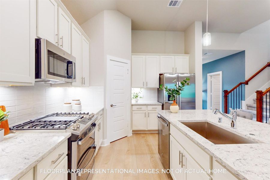 Furnished interior view inside a new home in Lone Star Landing, Montgomery (Image 14).