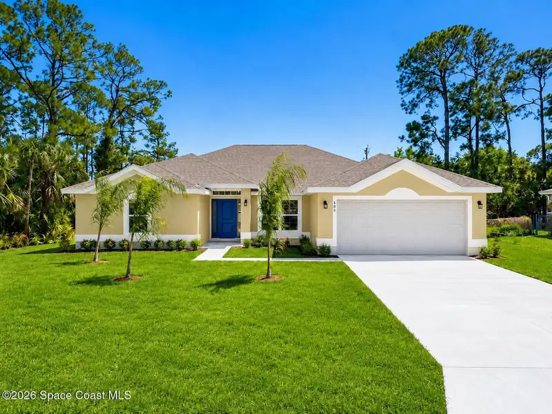 Front exterior of a new home in Palm Bay, Palm Bay, FL, highlighting curb appeal (Image 1). Front exterior of a new home in Palm Bay, Palm Bay, FL, highlighting curb appeal (Image 1).