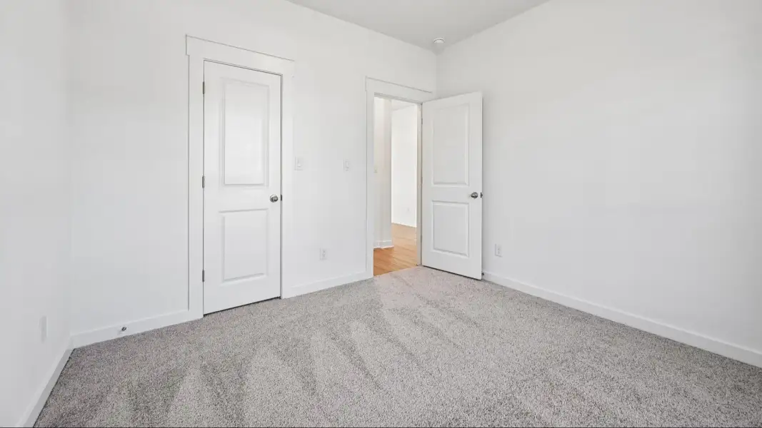 Furnished interior view inside a new home in Flora, Hutto (Image 26).