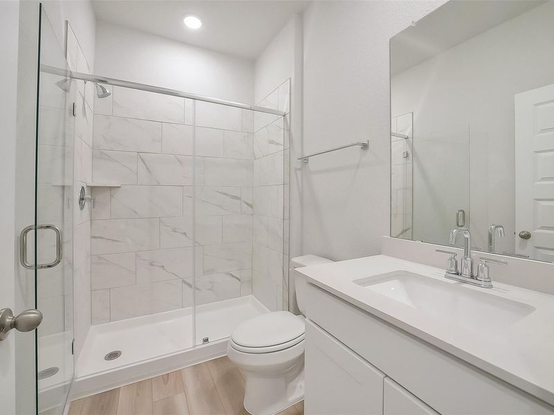 Furnished interior view inside a new home in Sunterra, Katy (Image 16).