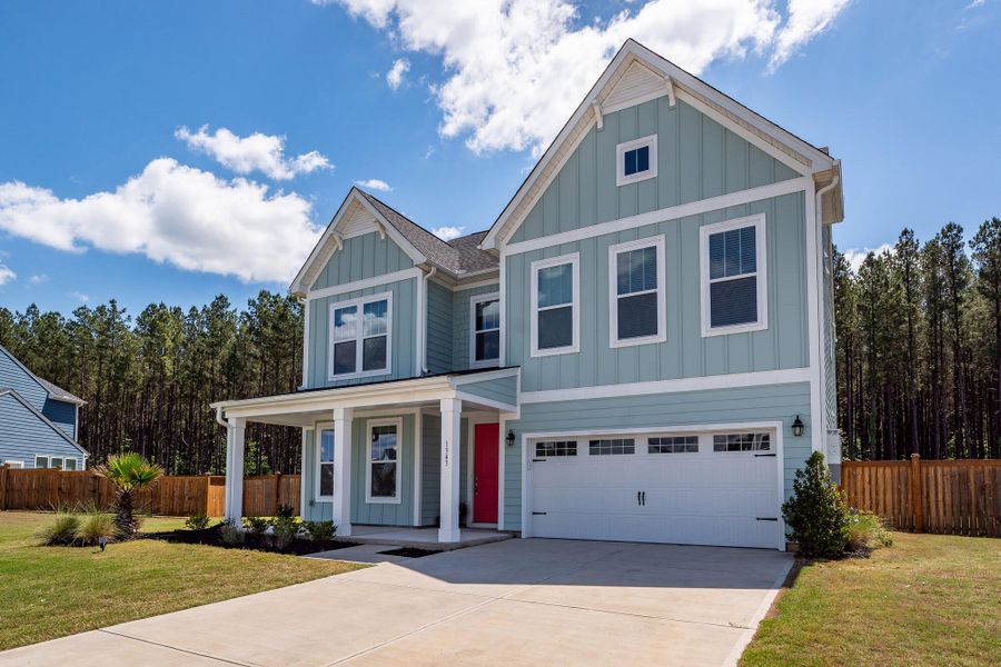 Front exterior of a new home in , Ravenel, SC, highlighting curb appeal (Image 29). Front exterior of a new home in , Ravenel, SC, highlighting curb appeal (Image 29).