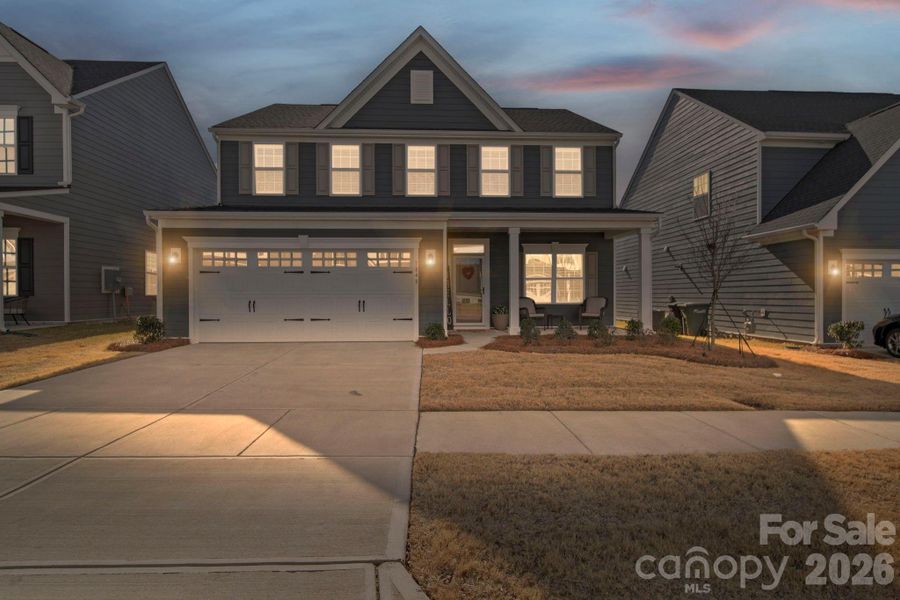 Front exterior of a new home in , Monroe, NC, highlighting curb appeal (Image 26).