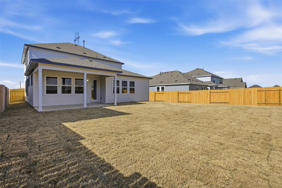 Exterior details and patio area of a home in Enclave at Cele, Pflugerville (Image 3).