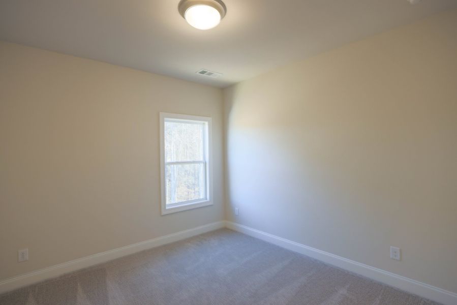 Representative unfurnished interior of a home built from the The Bennett by The Providence Group in Aberdeen, Hoschton (Image 40).