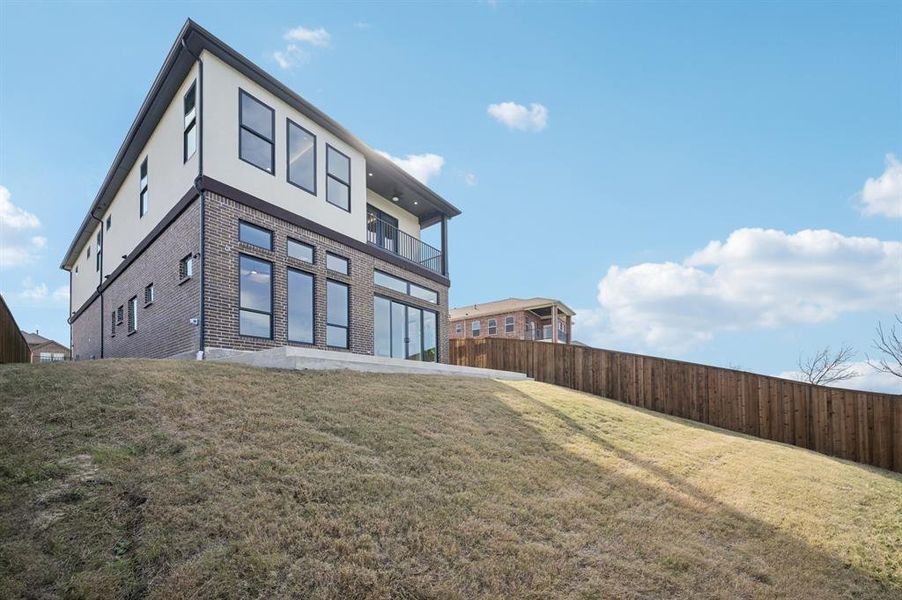 Elevated home brings water views closer to your window with room to build out the lakefront backyard of your dreams.