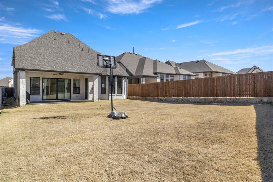 Exterior details and patio area of a home in , Aubrey (Image 21). Exterior details and patio area of a home in , Aubrey (Image 21).