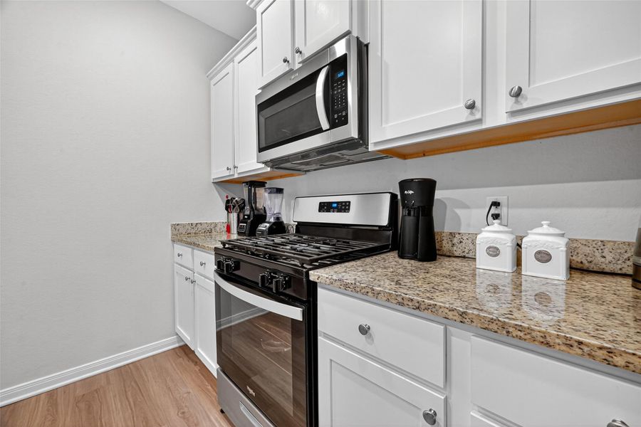 Gas range; stainless steel appliances. Gas range; stainless steel appliances.