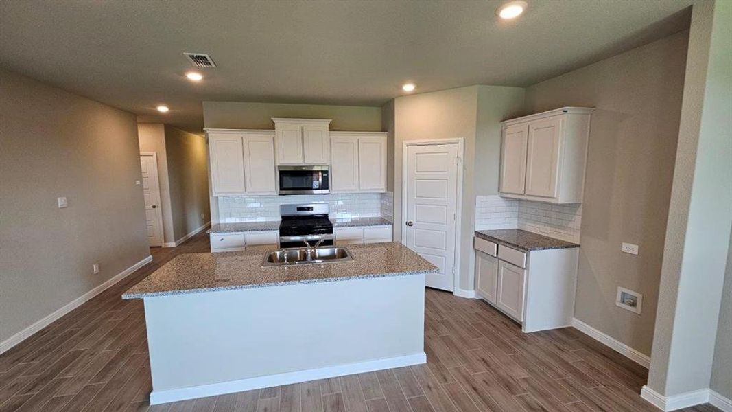 Furnished interior view inside a new home in Monarch at the Meadows, Krum (Image 5). Furnished interior view inside a new home in Monarch at the Meadows, Krum (Image 5).
