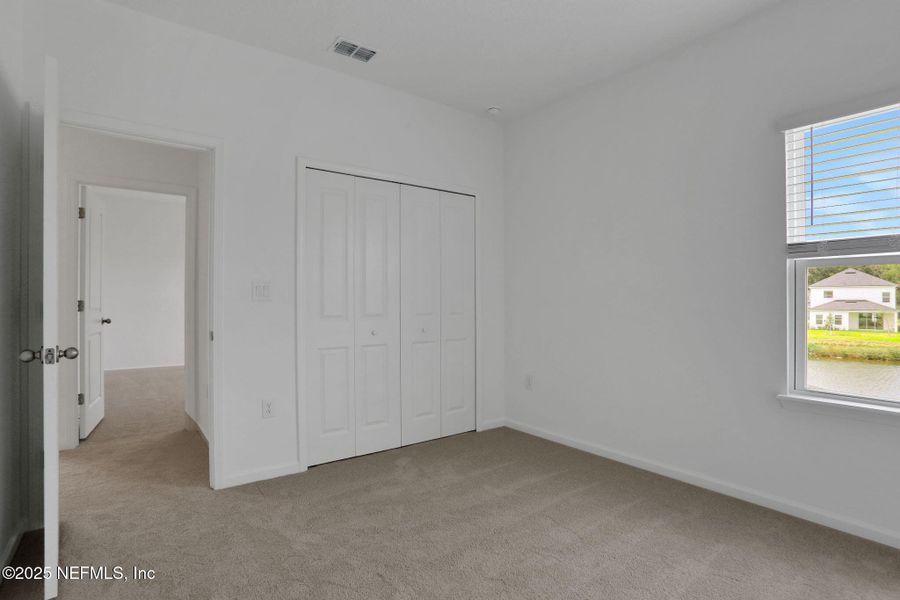 Spacious, unfurnished interior of a new home in TrailMark, St. Augustine (Image 20).