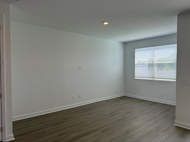 Family room space with a large double window - under construction