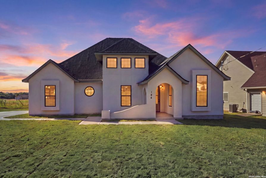 Front exterior of a new home in , Bandera, TX, highlighting curb appeal (Image 27). Front exterior of a new home in , Bandera, TX, highlighting curb appeal (Image 27).