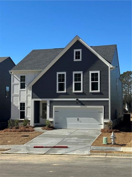 Front exterior of a new home in , Buford, GA, highlighting curb appeal (Image 1). Front exterior of a new home in , Buford, GA, highlighting curb appeal (Image 1).