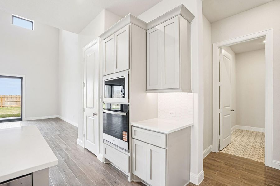 Furnished interior view inside a new home in Del Bello Lakes 60', Manvel (Image 17).