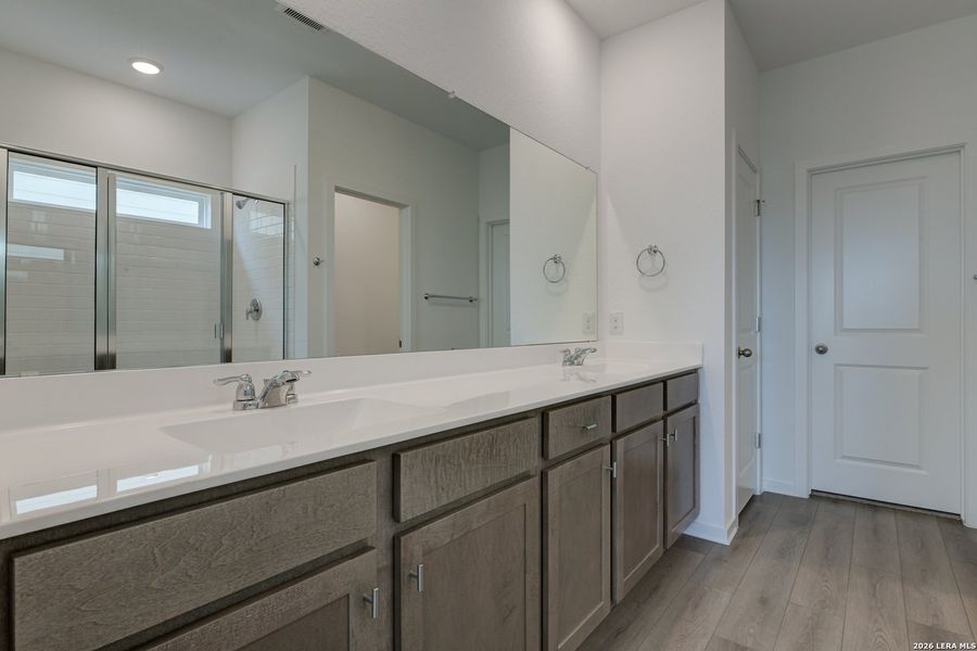 Furnished interior view inside a new home in Hennersby Hollow, San Antonio (Image 9).