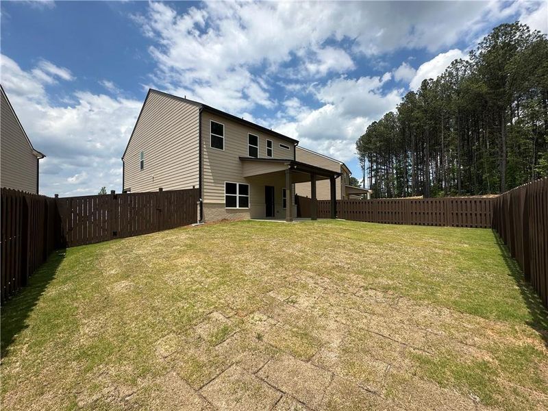 Exterior details and patio area of a home in Kentmere, Auburn (Image 3).