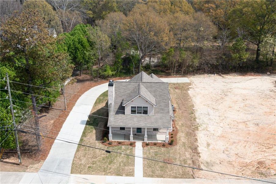 Front exterior of a new home in , Grayson, GA, highlighting curb appeal (Image 27).