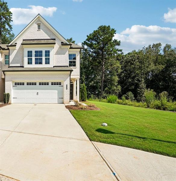 Front exterior of a new home in , Duluth, GA, highlighting curb appeal (Image 1). Front exterior of a new home in , Duluth, GA, highlighting curb appeal (Image 1).