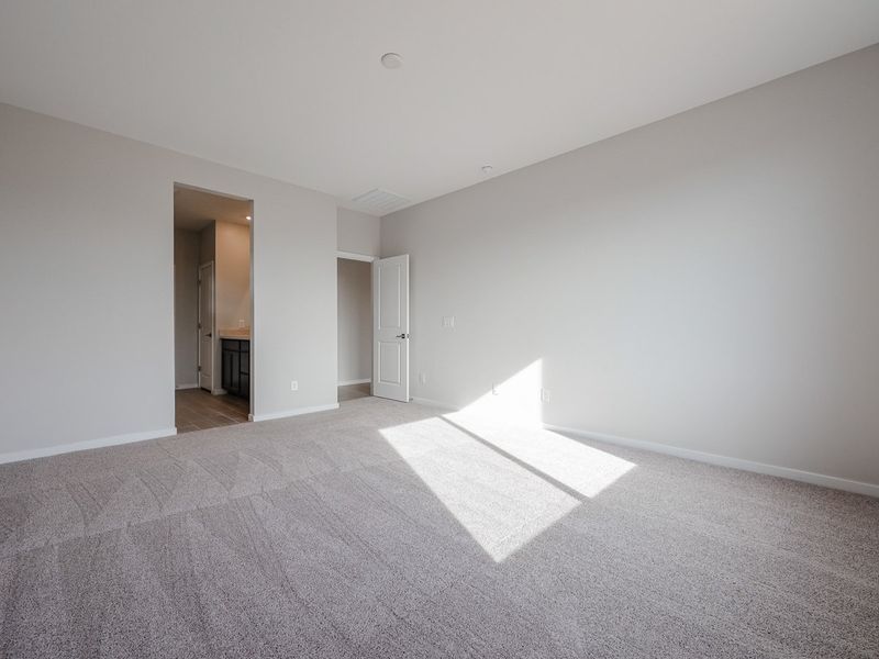 A long hallway with white walls. A long hallway with white walls.