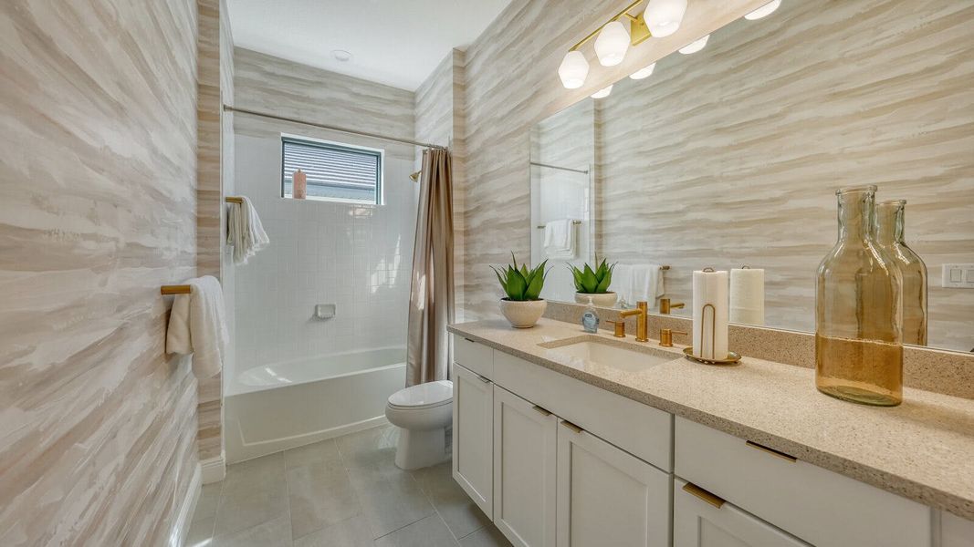 Furnished interior view inside a new home in SkySail Real Estate and Homes for Sale in Naples, FL - Neal Communities, Naples (Image 15).