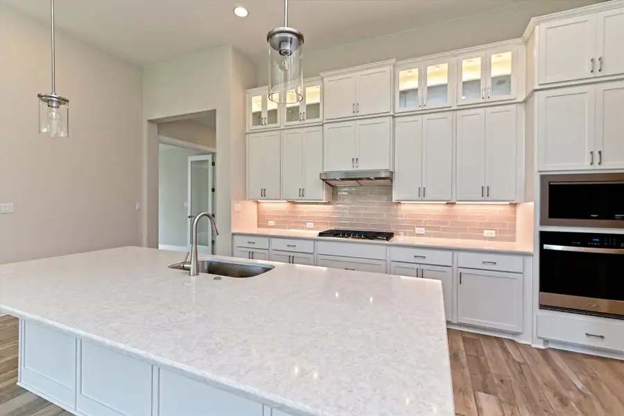 Representative furnished interior of a home built from the Opal by Giddens Homes in Riverstone, Georgetown (Image 8).