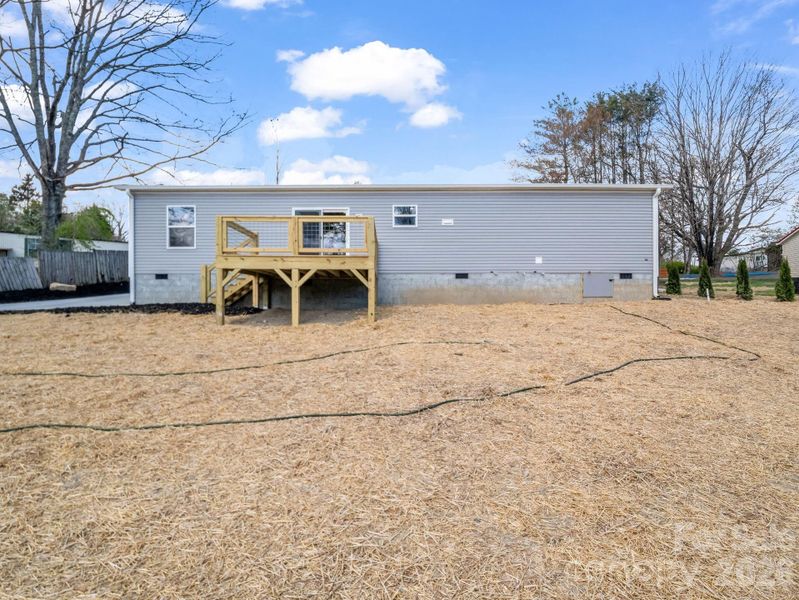 Exterior details and patio area of a home in , East Flat Rock (Image 16).