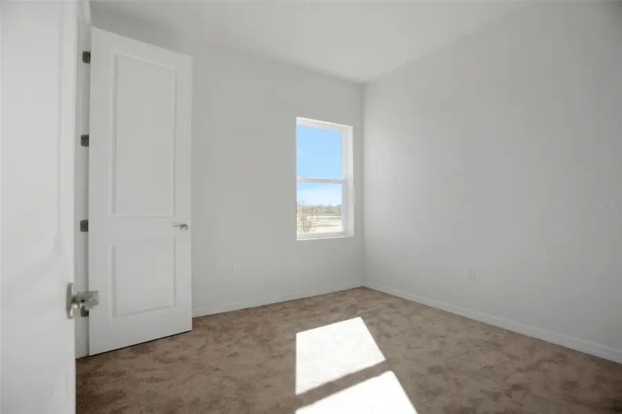 Spacious, unfurnished interior of a new home in Turnleaf, Punta Gorda (Image 22). Spacious, unfurnished interior of a new home in Turnleaf, Punta Gorda (Image 22).