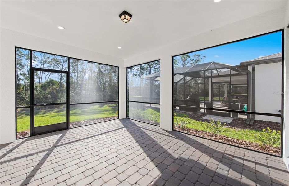 Exterior details and patio area of a home in Cedar Grove at The Woodlands, North Port (Image 3).