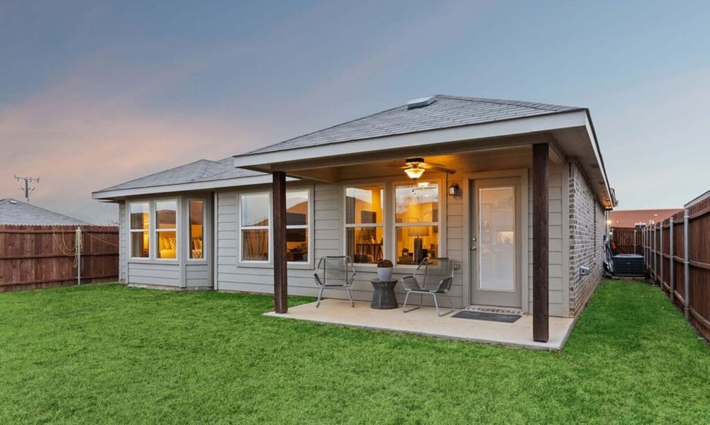 Front exterior of a new home in Rainbow Ridge, Fort Worth, TX, highlighting curb appeal (Image 24). Front exterior of a new home in Rainbow Ridge, Fort Worth, TX, highlighting curb appeal (Image 24).