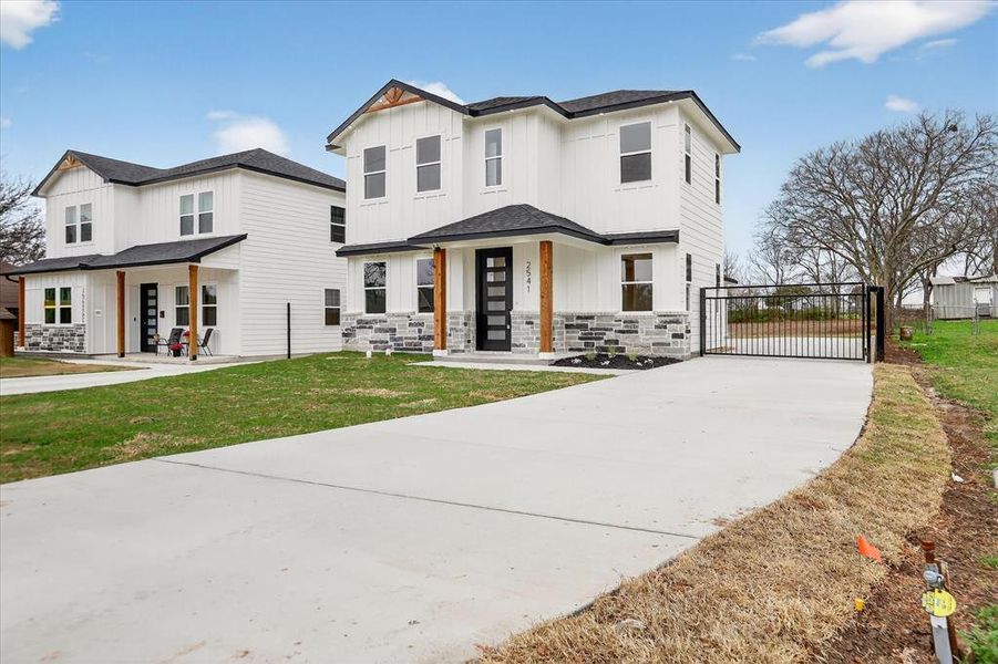 Front exterior of a new home in , Lancaster, TX, highlighting curb appeal (Image 23).